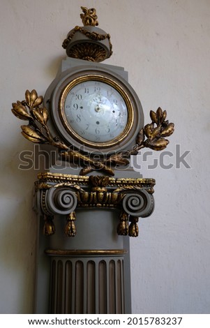 old clock in the interior close-up view