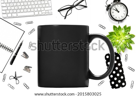 Black mug mock up. Office school props supplies on white background