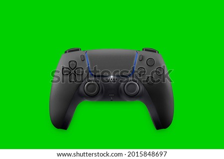 Next Generation black game controller isolated on green background. Top view. Chroma Key.
