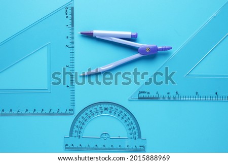A picture of geometry side on  blue background. Geometry and trigonometry concept