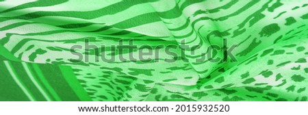 silk fabric with green-white stripes, zebra skin in African style. For the designer, the sketch of the layout, the entourage of the decorator. Background texture collection