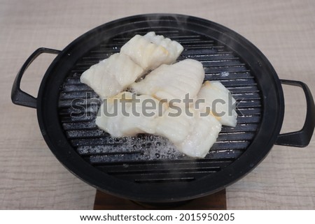 Fresh pansa fish fillet on white background