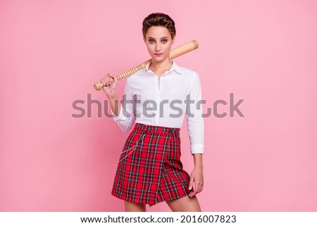 Photo of young serious cool woman hold hands baseball bat wear plaid skirt isolated on pink color background Royalty-Free Stock Photo #2016007823