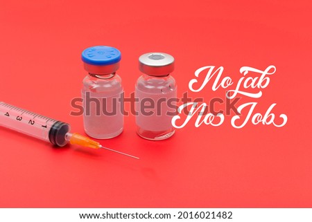 A quote "No jab No Job" with decorations (needle, syringe and two drug ampoules), on red background. A medical or vaccination concept photo. 