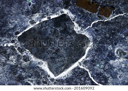 Abstract composition with cracked soil and inverted colors 