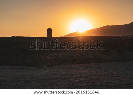 sunset and mountain view and historical domed building.