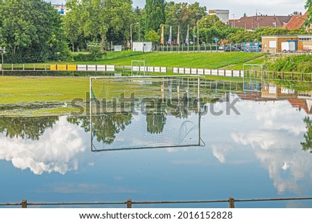 Picture of flooded soccer field during high water due to heavy rains during daytime