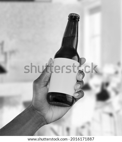 A picture with a label that can be used to write anything bottle