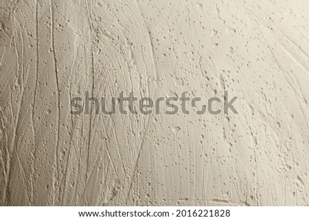 Light plaster texture. The surface is covered with plaster. 