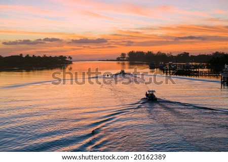 fishing boats heading toward the ocean at jupiter inlet in south florida Royalty-Free Stock Photo #20162389