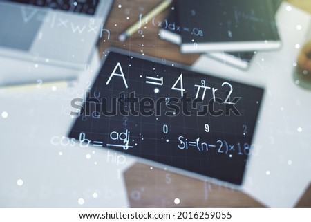 Creative scientific formula concept and modern digital tablet on background, top view. Multiexposure
