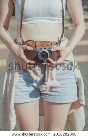 Beauty brunette woman posing in the street, make photo, using photo camera, outdoor hipster portrait, photographer, Thailand, sunglasses, photographer, travel blogger, watch, cafe, happy face, smile