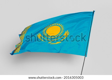 Kazakhstan flag isolated on white background. National symbol of Kazakhstan. Close up waving flag with clipping path.