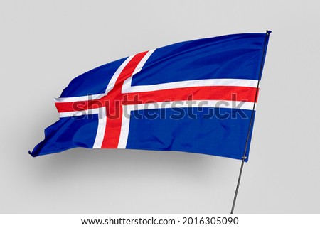 Iceland flag isolated on white background. National symbol of Iceland. Close up waving flag with clipping path.