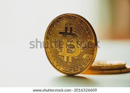 Gold Bitcoin Cryptocurrency Coins. Stock Market Concept, digital money and stock business.