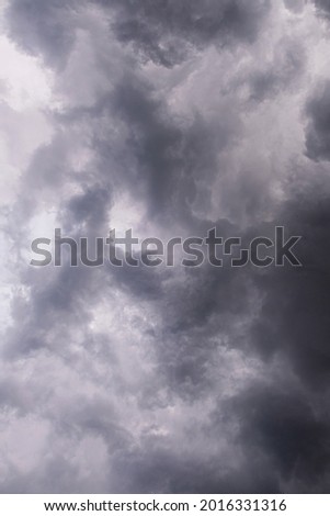 Dark, dense and magnificent, gray storm clouds