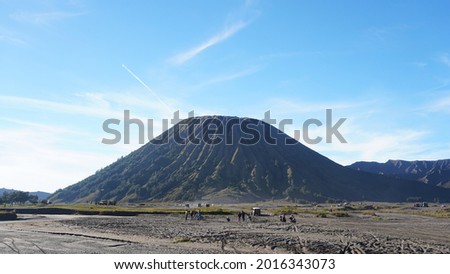 The landscape of the sea of ​​sand and Mount Batok in Bromo Tengger Semeru National Park