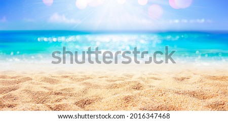 Beach - Sand With Abstract And Defocused Ocean In Background