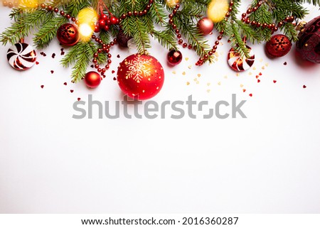 Christmas holidays composition with red balls on white background with copy space for your text