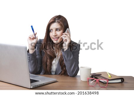 Brunette businesswoman with listening music on the desk sitting at office relaxation isolated on white back ground