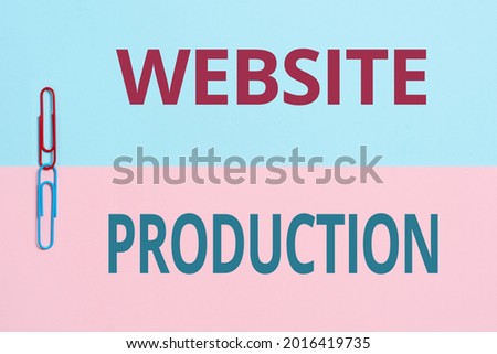 Inspiration showing sign Website Production. Business idea process of creating websites and it s is components Two Objects Arranged Facing Inward Outward On a Separated Coloured Background