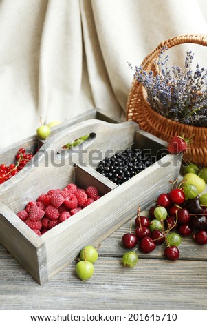 Still life with berries and flowers
