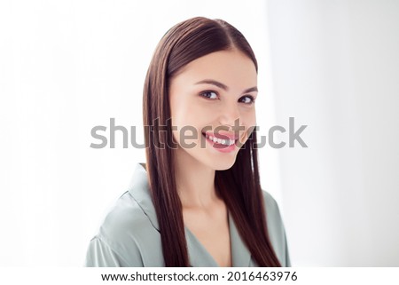 Photo of sweet adorable young lady grey sleepwear smiling indoors room home house