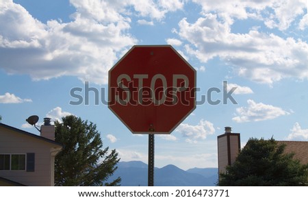 A stop sign with clear sky