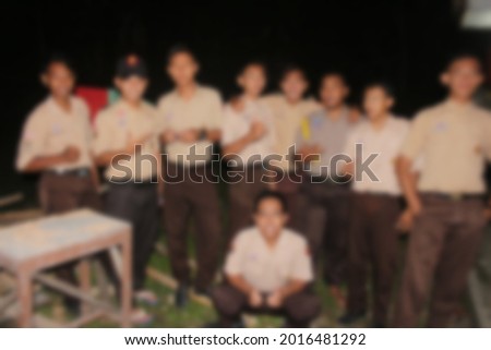 Blur photo of boy scouts doing activities