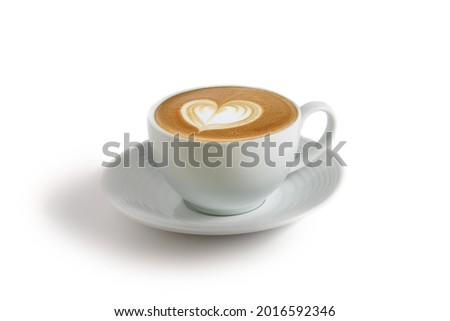 Front view of hot cafe Latte coffee with heart shape latte art in white ceramic cup isolated in white background. Arabica Espresso roasted coffee Royalty-Free Stock Photo #2016592346