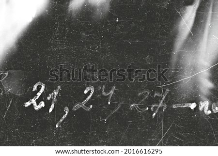 Dusty scratched grunge scanned old film texture Royalty-Free Stock Photo #2016616295