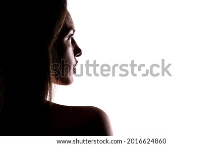 silhouette profile of a beautiful female model isolated on white background