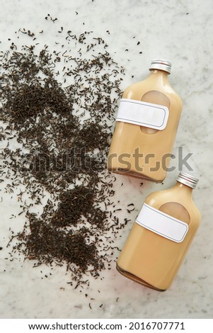 Glass bottle drinks and dried herbs