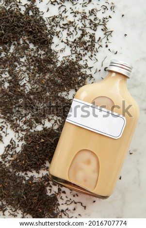 Glass bottle drinks and dried herbs