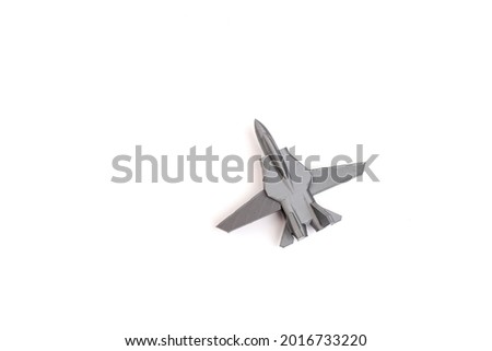 Model grey miniature fighter jet created on a 3d printer, on white background. transportation concept