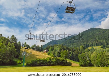 Carinthia landscape with ski lift in background with mountains