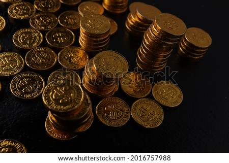 a lot of coin and gold isolated dark mood black background