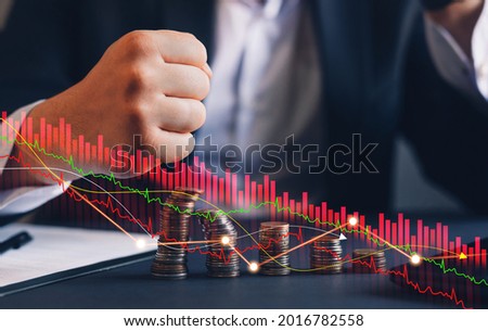 Depressed businessman lost his business and decrease in income. Destroyed businessman. Concept of business loss, bankruptcy and crisis.
 Royalty-Free Stock Photo #2016782558