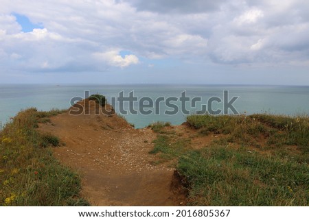 Photo of the edge of a cliff to the sea Royalty-Free Stock Photo #2016805367