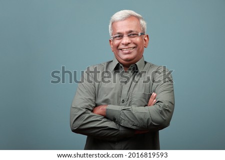 Portrait of a smiling man of Indian ethnicity  Royalty-Free Stock Photo #2016819593