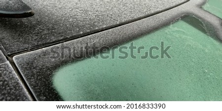 car roof with frozen ice. High quality photo