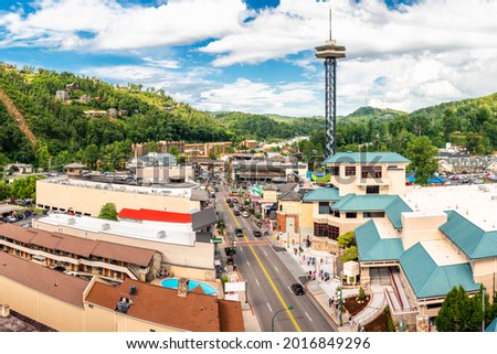 Aerial view of Gatlinburg above US-441. Gatlinburg is a popular mountain resort city in Sevier County, Tennessee, as it rests on the border of Great Smoky Mountains National Park. Royalty-Free Stock Photo #2016849296