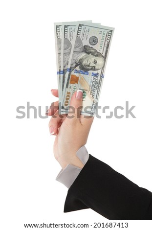 Hand holding money in dollars isolated on white background