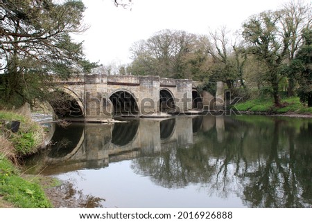 historic sunderland bridge reflected in a river