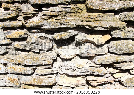 Stone wall texture backgraound. High quality photo. Selective focus