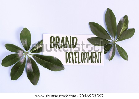 Hand writing sign Brand Development. Conceptual photo improving customers knowledge and opinions of a brand Creating Nature Theme Blog Content, Preventing Environmental Loss