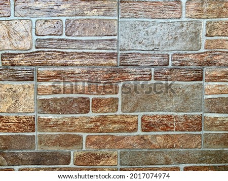 Texture of a ceramic wall. Ceramic wall as a background or texture. That resemble pieces of stone