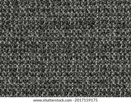 Close-up of the fabric textile texture, background and wallpaper. The texture of fabric textile upholstery of furniture. High-quality photography.