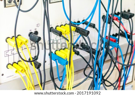 Colorful wires being used in electrical laboratory to make connection between each node