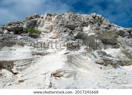 The cliff on Grand Turk island shore eroded by water and wind (Turks and Caicos Islands).